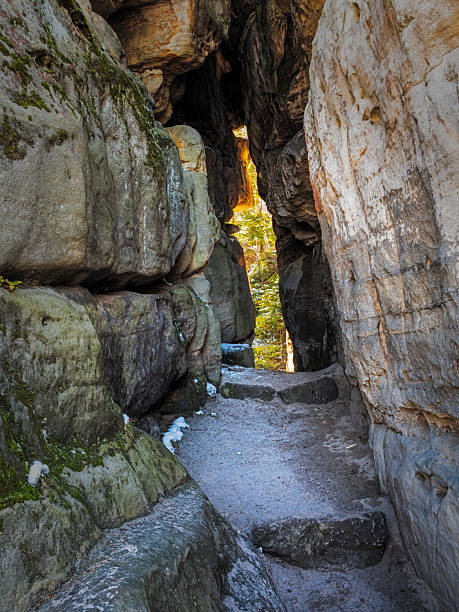 istock Exploring a Narrow Pathway Through Majestic Rock Formations 2223424122