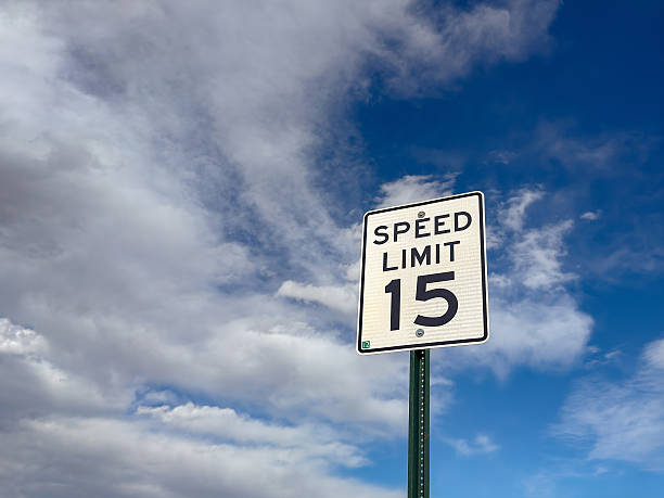 istock Speed limit sign isolated against a blue sky 2223424945