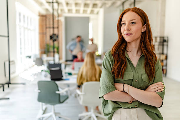 istock Professionals collaborating in a Nordic style office space while discussing innovative ideas for business development 2223426301