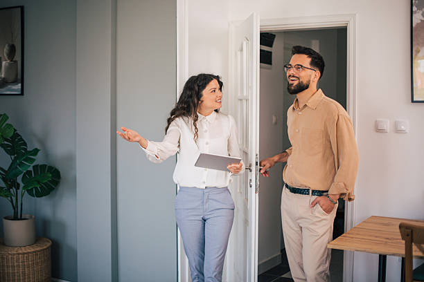 istock Real estate agent showing modern apartment to client 2223426340
