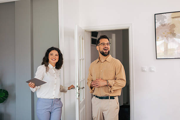istock Real estate agent showing apartment to happy client 2223426418