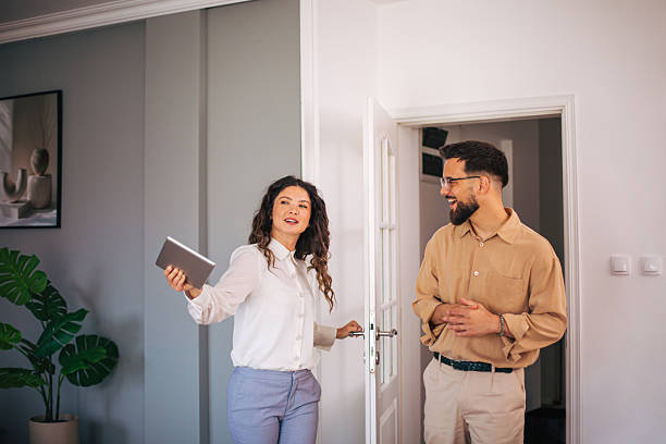 istock Real estate agent showing modern apartment to client 2223426475