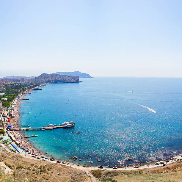 crowded beach at the Black sea in Sudak in Crimea