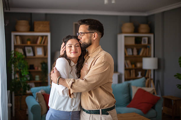 istock Loving embrace in cozy living room setting 2223430127