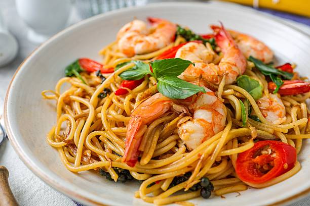 istock Stir Fried Spicy Spaghetti with shrimps in a white plate 2223433091