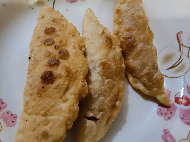 istock Close up of traditional indian deep-fried samosas. 2223434997