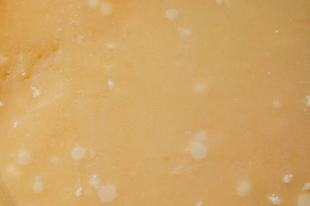 texture of cut wedge of Italian hard cheese