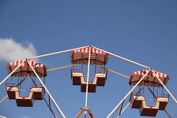 istock Vintage Ferris Wheel with Striped Canopies 2223436914