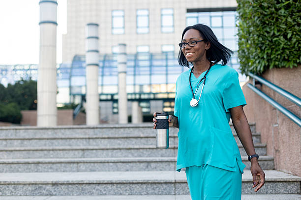 istock Doctor walking on a street 2223437420