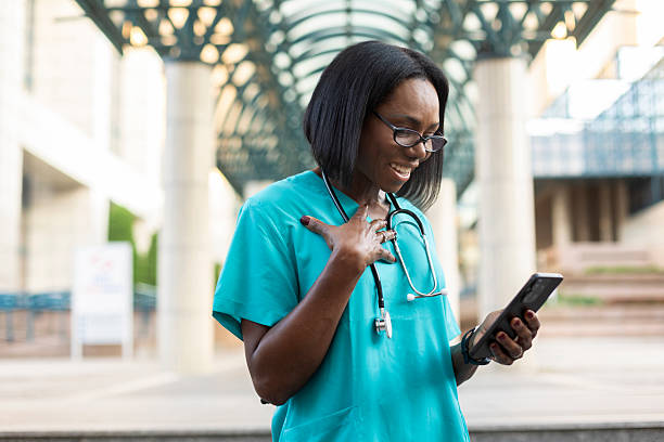 istock Surprised doctor looking at a phone 2223438178