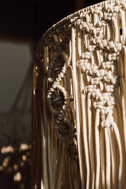 istock Handmade macrame art displayed in a cozy indoor space with natural light in the afternoon 2223443738