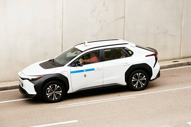 Minsk, Belarus, March 20, 2025 - Side view white japanese car Subaru Ascent parked in city