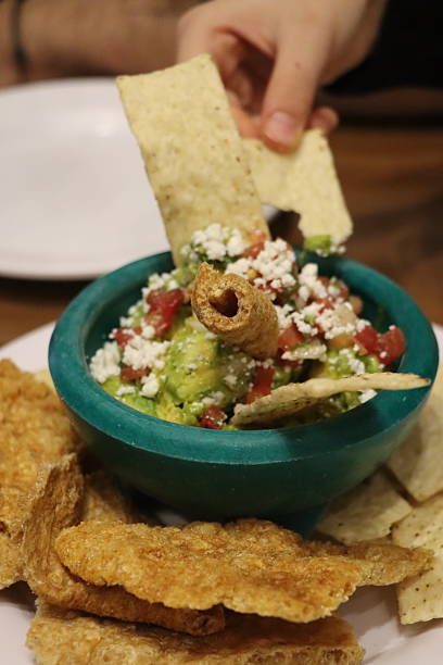 Traditional guacamole topped with fresh cheese