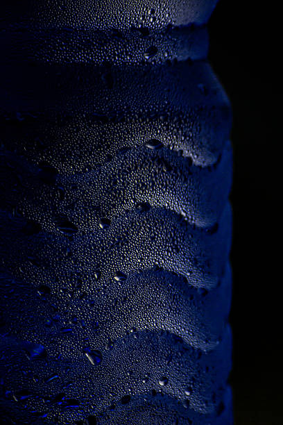 Close up of a sparkling water bottle with condensation on it