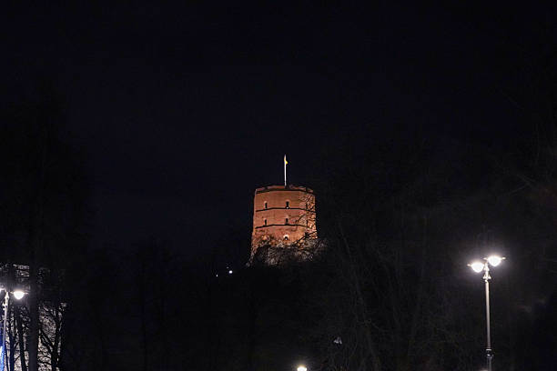 istock Lit up Gediminas tower in dark 2223450801