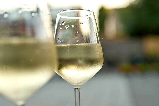 istock Chilled white wine glasses in outdoor setting 2223457340