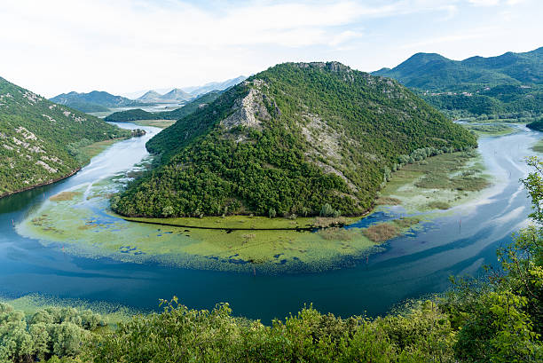 istock Crnojevica River flows into Lake Skadar, summer mountains Montenegro landscape 2223459280