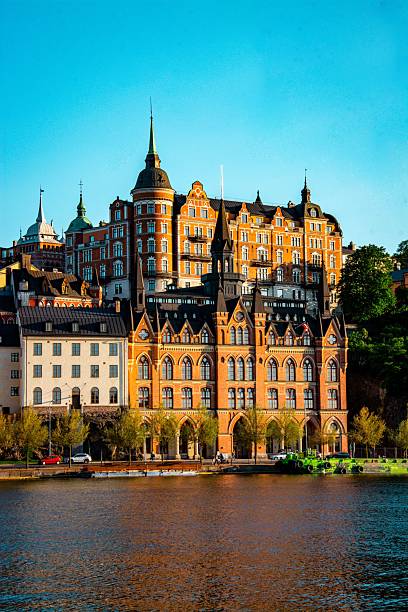 istock Historic Munchenbryggeriet along Stockholm's waterfront under a blue sky 2223460192