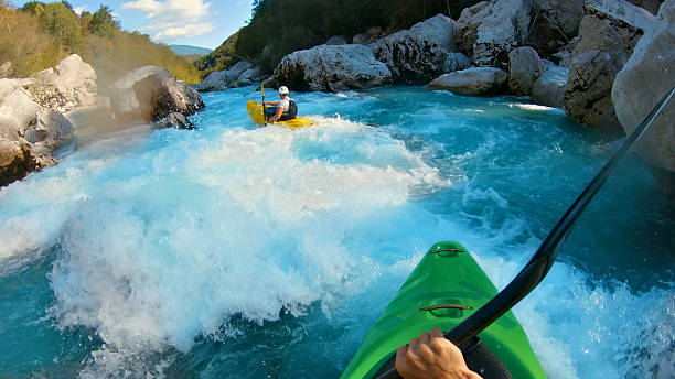 istock Kayaker conquers rapids, navigating through turbulent waters with skill and determination 2223465801