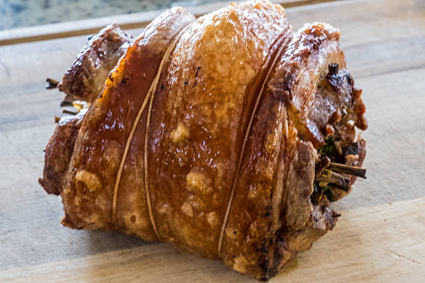 istock Sizzling belly lechon cooked to perfection for a festive celebration 2223469686