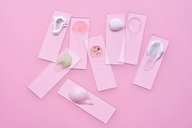 istock Samples of multi-colored cosmetic products on a pink background. 2223477207