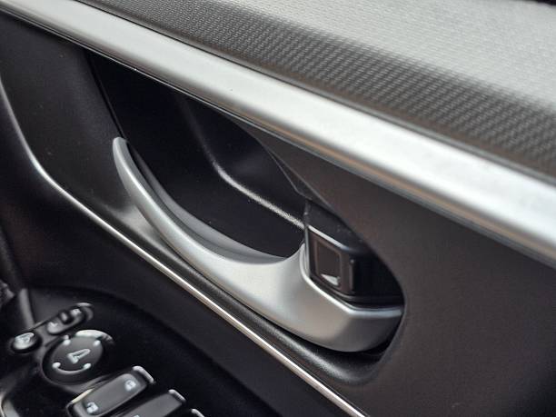 istock Close-Up View of Car Door Handle and Interior Design Elements 2223478258