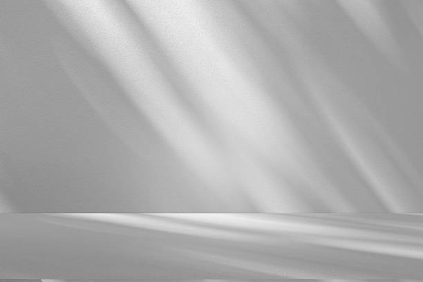 istock Wall interior background, studio and backdrops show products.with shadow from window color white . background for text insertion and presentation product 2223481485