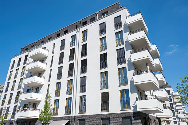 istock White multi-family residential building 2223483312