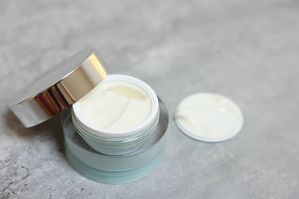 istock Body cream on grey table, closeup. Space for text 2223483362