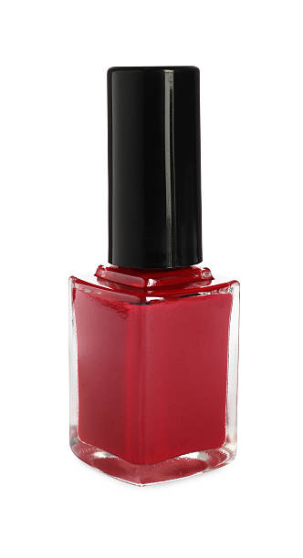 istock Red nail polish in bottle isolated on white 2223483970