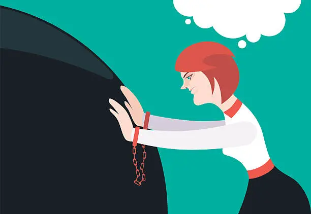 woman pushing big ball but hands being chained woman pushing big ball but hands being chained