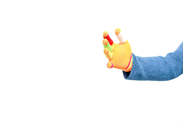 A hand with colorful finger tips, isolated on white backdrop, studio shot showing a vibrant glove