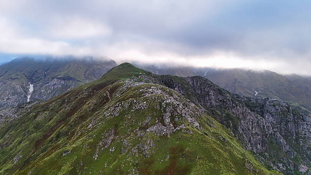 istock Cloud-Covered Ridge on Shrikhand Mahadev Trail  Aerial Himalayan View 2223498432