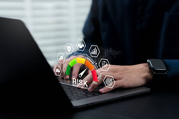 istock Risk management. Businessman analyzes risk scale. Identifying, assessing, and mitigating to minimize future occurrences. Financial management strategies to control and reduce investment risk. 2223501388