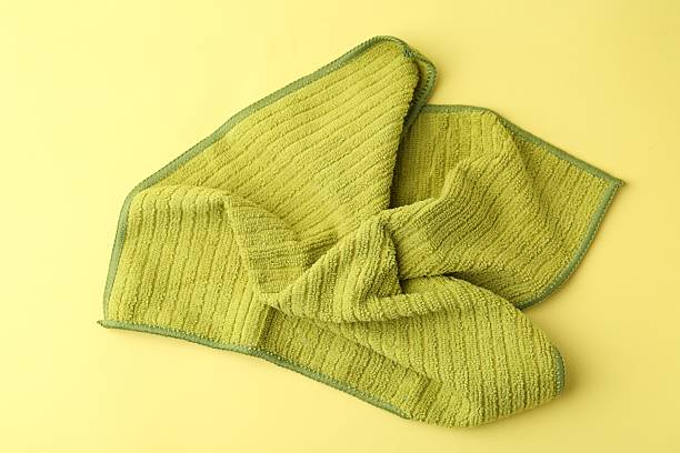 istock Clean green microfiber cloth on yellow background, top view 2223505298