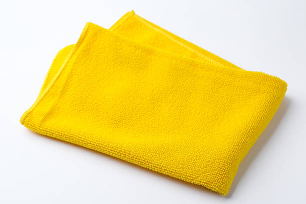 istock Clean yellow microfiber cloth on white background, closeup 2223505470