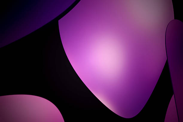 istock Soft focus abstract background with glowing purple shapes on a dark backdrop, creating a gentle and ethereal modern design 2223506064