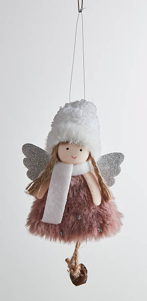 istock Dolls, angels, party decorations, hanging with Christmas strings isolated nature background with clipping path 2223508143