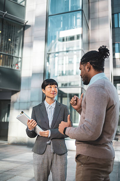 istock Business professionals engaging in outdoor discussion 2223515307