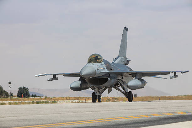 istock F-16 Fighting Falcon fighter plane on runway 2223521984