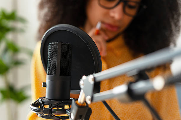 istock Podcaster preparing to record a new episode 2223522668
