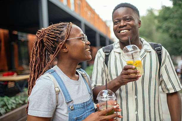 Couple with summer drinks outdoors