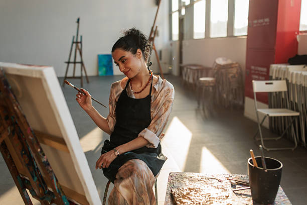 istock Beautiful Female Artist Creating Artwork 2223537367