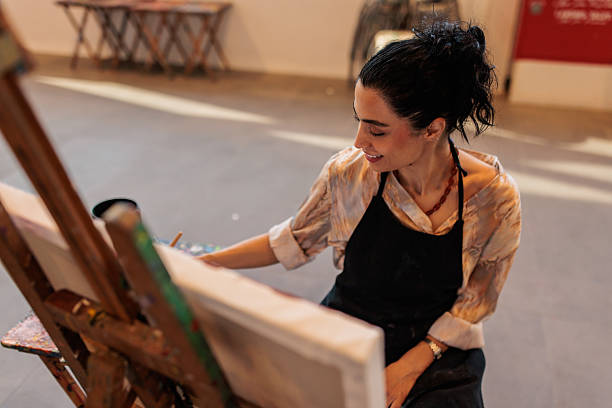 istock Beautiful Female Artist Creating Artwork 2223537421