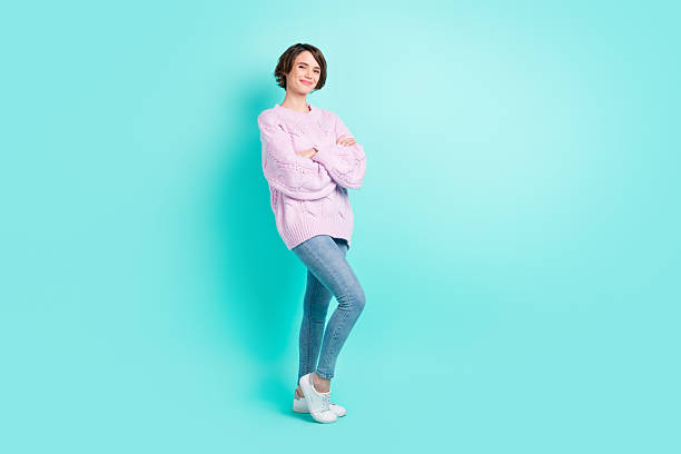 istock Full length photo of charming pretty young lady dressed purple pullover standing arms folded isolated teal color background 2223546749