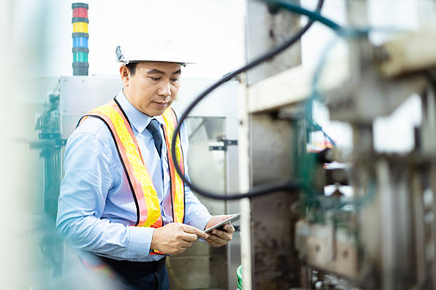 istock Asian engineer manager checks the machine and system in facility. 2223556235