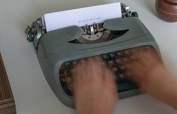 istock Journalist writing on a vintage typewriter the best is yet to come 2223560278