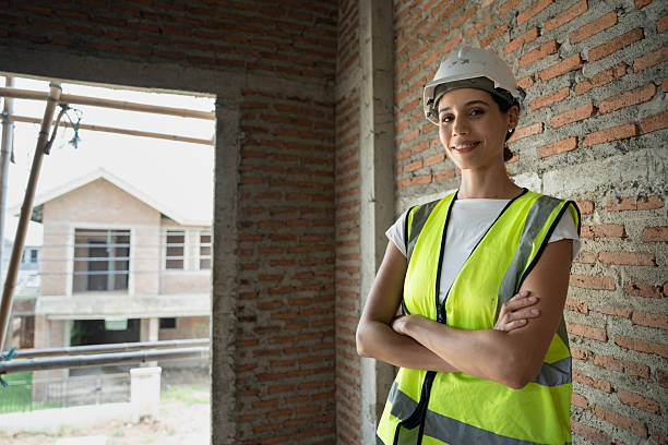 istock Portrait Engineer woman builder. Foreman working in construction site. 2223568209
