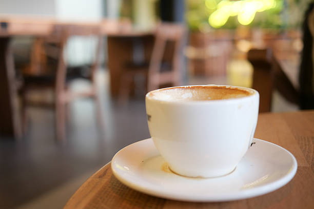 istock Enjoying coffee in a cozy cafe with warm ambiance 2223568865
