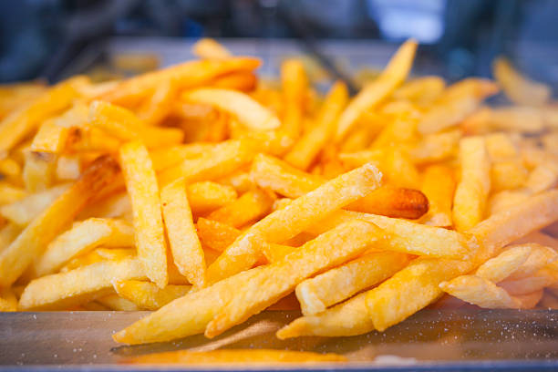istock Crispy golden fries served in a fast food restaurant setting 2223570468